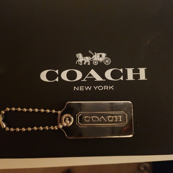 Coach Handbags - Coach Metallic Silver Key Holder